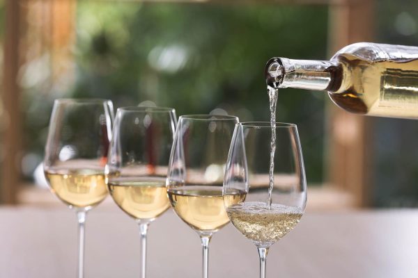 TAL-header-pouring-glasses-white-wine-WHITEWINE1122-6d1399bc2aa9425b829a6c5bee833d0c